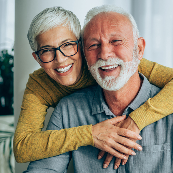 Portrait of happy smiling senior couple at home. placeholder x