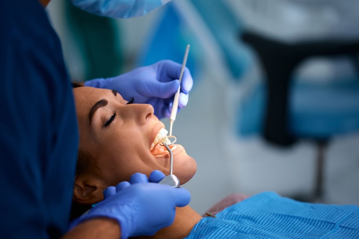 Untitled design (42) patient with dentist